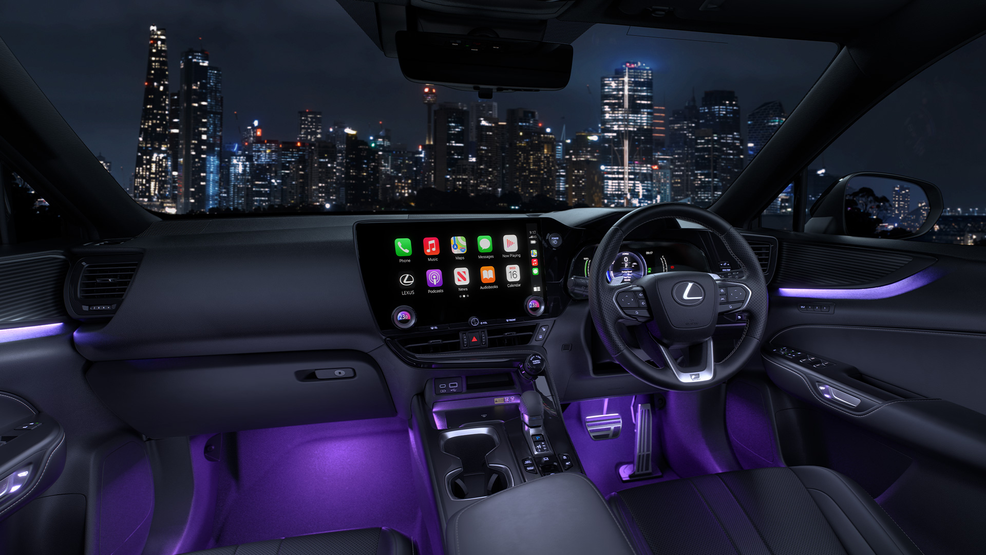Purple lit interior of the Lexus NX 450h+ with a city skyline.